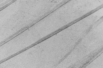 Abstract asphalt street road background with black tire marks on race track, Texture and background...