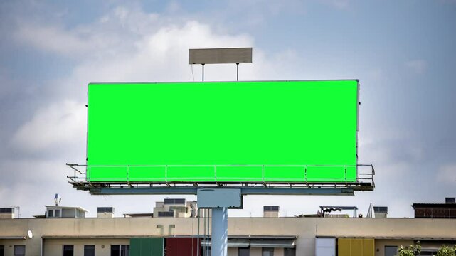 large outdoor advertising board with green screen