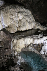 Stunning view of the New Athos stalactite cave in Abkhazia, Georgia. The limestone formations,...