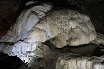 Stunning view of the New Athos stalactite cave in Abkhazia, Georgia. The limestone formations,...