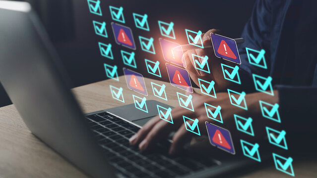 Digital error detection and troubleshooting concept showing warning signs among checklist icons on screen during system inspection.