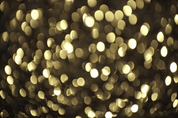 Golden bokeh lights on dark background