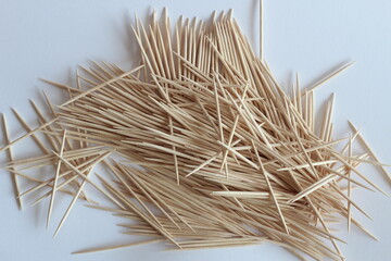 Group of toothpicks scattered on the table from close up