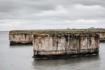 Coastal rock formations, overcast sky