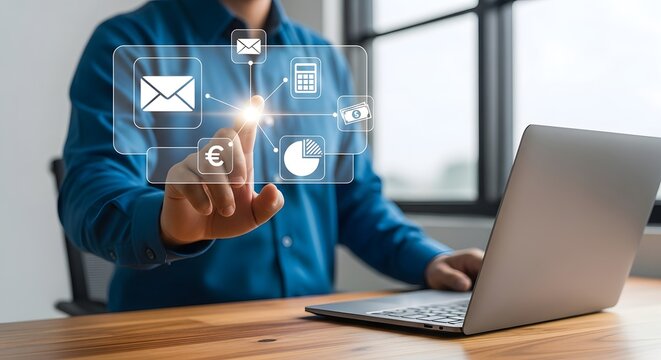 Person interacts with digital interface for finance, analysis, and communication using laptop technology.