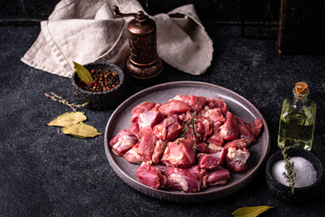 Raw chopped meat with spices