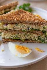 Delicious cottage cheese egg salad sandwich on whole wheat toast