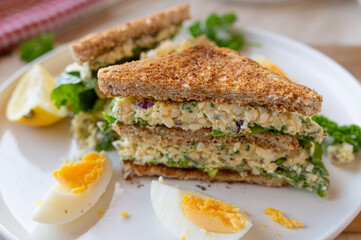 Delicious cottage cheese egg salad sandwich on whole wheat toast