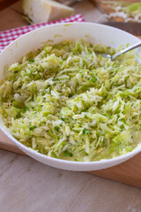 Traditional old fashioned german coleslaw fresh and homemade prepared in a bowl