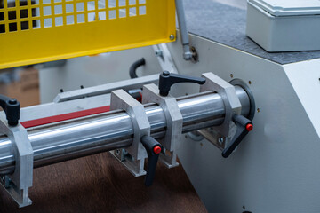 Industrial Machine Shaft with Dual Clamps and Safety Guard – Precision Equipment Detail