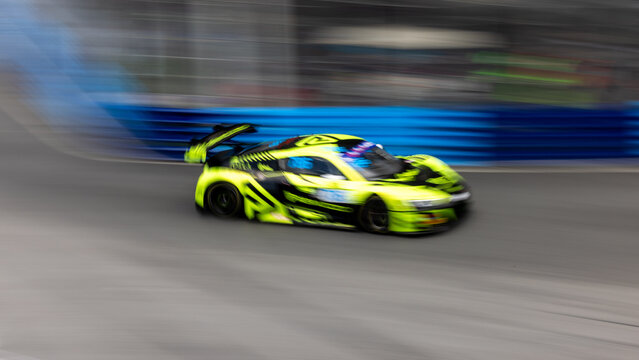 Motion blur race car racing on speed track, Motion blurred super car race on street track circuit, Automobile automotive transportation vehicle background,