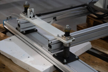 Industrial Robotic Module with Spring Assembly and Aluminum Frame – Manufacturing Equipment Close-Up