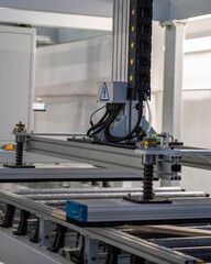 High-Tech Robotic Assembly with Cable Carrier and Spring Mechanism – Industrial Automation Close-Up