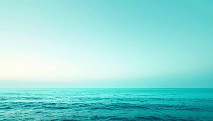 Obraz premium Calm Teal Sea Horizon Under a Clear Sky