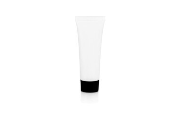 A blank white cosmetic cream tube with a black cap for a product mockup. A container for lotion, gel, or beauty products, isolated on white background with clipping path.