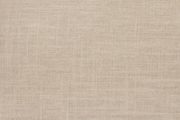 Brown linen fabric cloth texture for background, natural textile pattern.