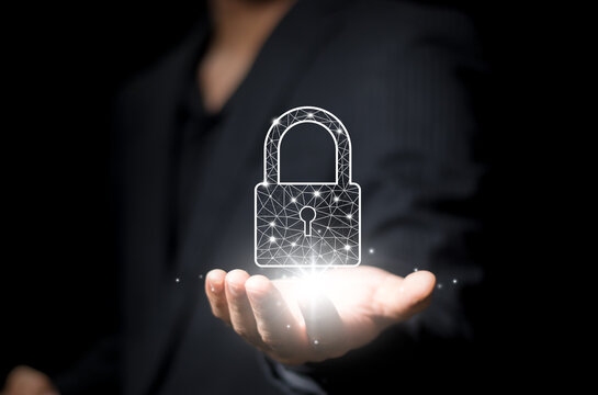 businessperson hand holding a lock padlock icon.Cyber security network. Internet technology networking.Protecting data personal information on tablet. Data protection privacy concept. GDPR. EU.Banner.