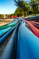 Plastic cable ducts for communication lines. Close-up.