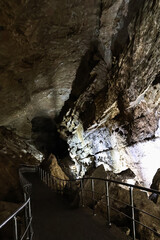 Stunning view of the New Athos stalactite cave in Abkhazia, Georgia. The limestone formations,...