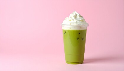 Aesthetic Iced Matcha Coffee Latte in Clear Cup with Pink-Green Milk Layers and Whipped Cream, Set Against a Pastel Pink Background with Soft Shadows and Minimal Styling