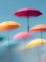 Blurred photography of colorful umbrellas moving in the breeze outdoor festival vibrant atmosphere dynamic viewpoint