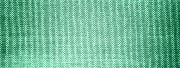 Texture light mint textile material background, macro weave pattern. Structure green fabric backdrop, vignette
