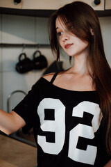 girl with long hair in the kitchen