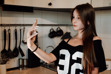 girl with long hair in the kitchen
