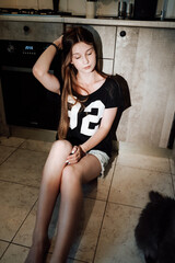 girl with long hair in the kitchen