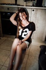 girl with long hair in the kitchen