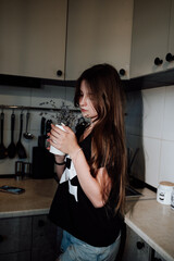 girl with long hair in the kitchen