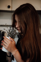 girl with long hair in the kitchen