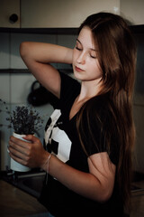 girl with long hair in the kitchen