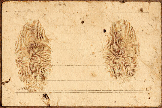Old paper with two faded fingerprints, textured surface, and visible aging marks, evokes sense of identity erosion and history, suitable for forensic, security, or vintage documentation themes