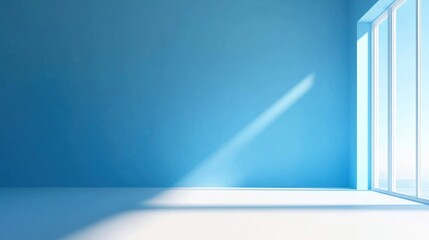 A spacious, minimalist blue room with a large window, white floor, and a shadow cast by the window on the wall.