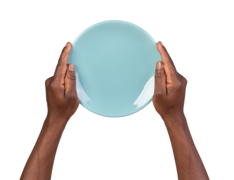 Human hands holding an empty plate isolated on white or transparent background, top view