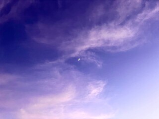 moon blue sky with clouds