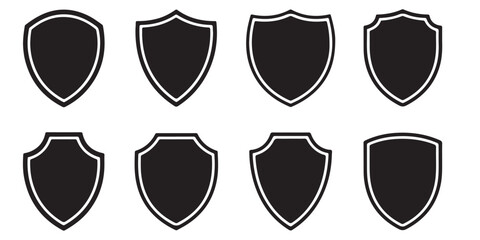 Set of vector various style shields. Shield icon vector, black silhouettes	