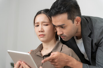 business man sexually harassed a female colleague by touch her shoulder. Sexual harassment in...