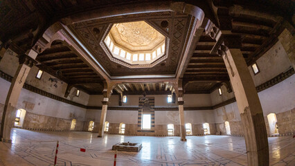 Historic Building Interior with Ornate Wooden Ceiling. Ancient Aleppo city citadel throne room,...