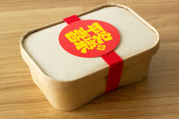 a closed box of different types of traditional chinese tea isolated on wooden background