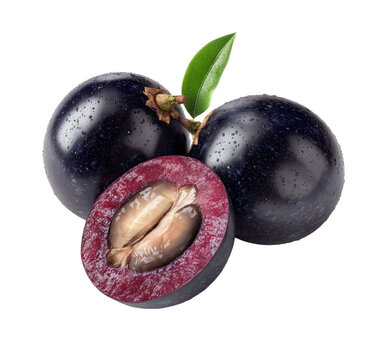 Freshly cut black plum fruit with green leaf isolated on a black background