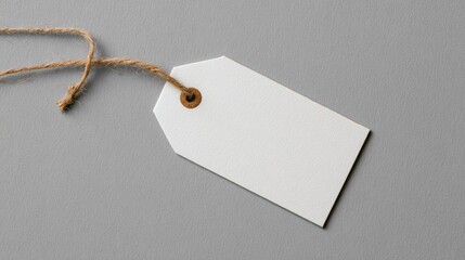 Photo of a blank gift tag on a light gray background