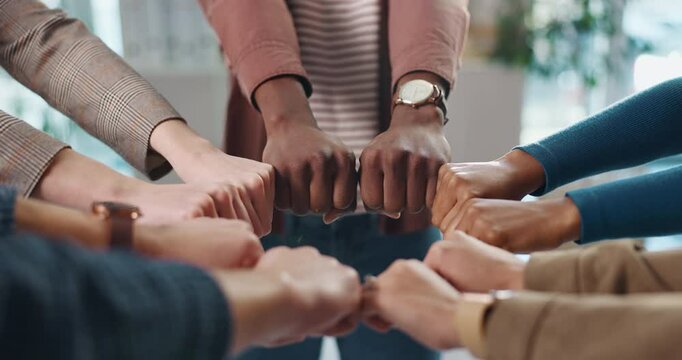 Fist bump, hands and business people in office for teamwork, collaboration and support. Professional, startup company and workers with synergy in circle for solidarity, cooperation and partnership