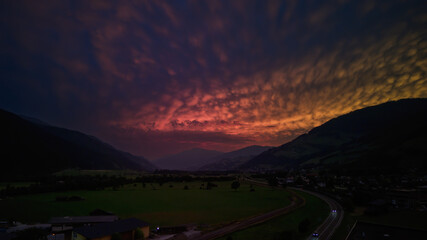 beautiful colorful sunset over the mountains in the hohen tauern national park in austria, at a summer evening