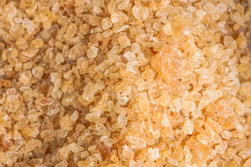 Gum arabic resin (Acacia senegal) , with its granular texture and golden tones, represents a...