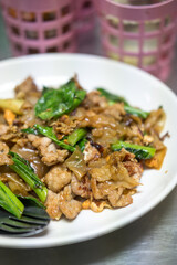 A classic plate of Thai stir fried noodles. Thai called Pad See Ew