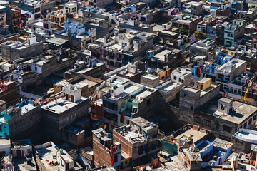 Aerial View of Jaipur, the Pink City of Rajasthan – Historic Architecture, Colorful Rooftops, and Urban Landscape Surrounded by the Aravalli Hills