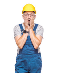 Awakening, construction worker waking up and holding hands on cheeks, isolated on white background. Craftsman against white wall