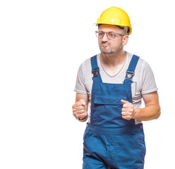 Aggressive middle-aged construction worker shouting or yelling while looking to side, isolated on white background. Craftsman against white wall
